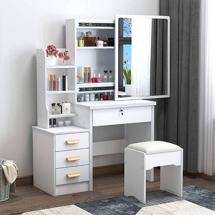 five drawer tabele attached with beautiful section and a closed door color whitr