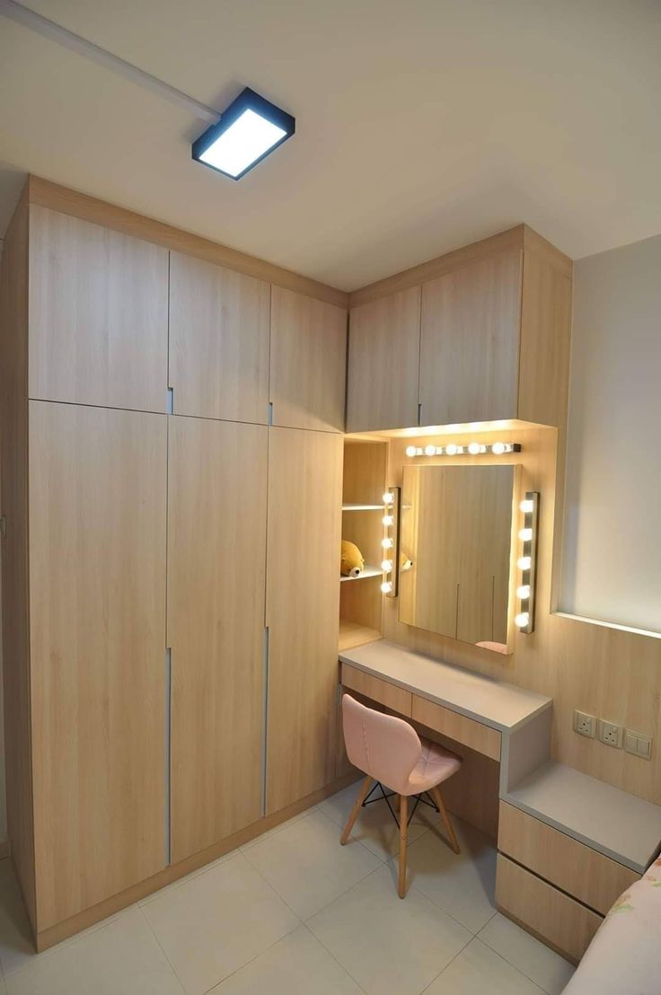 three door cabinetry with upper drawers